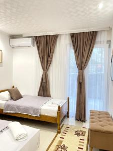 Postel nebo postele na pokoji v ubytování Becic Apartments