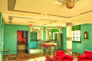 Зона вітальні в Tamraght 2 Bedroom Apt with Oceanview 3. Level