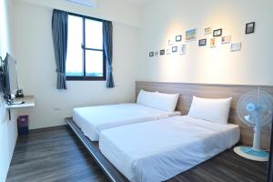 Letto o letti in una camera di Little Butler B&B