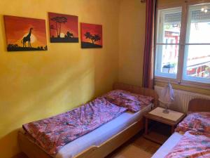 Letto o letti in una camera di Ferienwohnung Schreiner