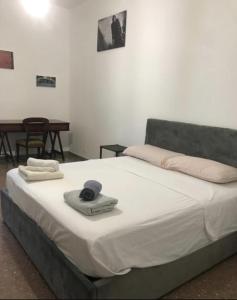 Tempat tidur dalam kamar di Villa Fiorelli rooms