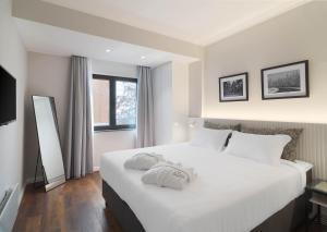 Postel nebo postele na pokoji v ubytování Le Vert Suites Platres
