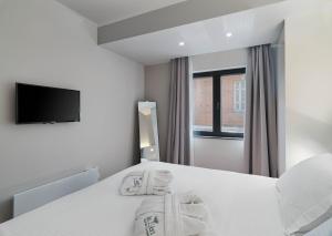 Postel nebo postele na pokoji v ubytování Le Vert Suites Platres