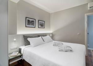 Postel nebo postele na pokoji v ubytování Le Vert Suites Platres