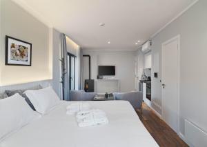 Postel nebo postele na pokoji v ubytování Le Vert Suites Platres
