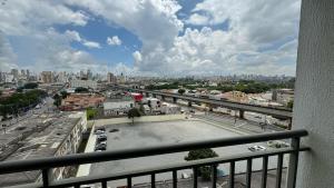 a view of a city from a balcony at HM - Aconchegante Apto em Santana in São Paulo