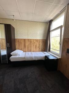 Letto o letti in una camera di Flex-Inn