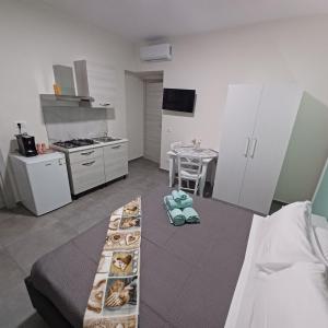 Kuchyň nebo kuchyňský kout v ubytování ACRONE GUEST HOUSE Centro Città (Locazione Turistica)