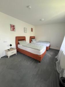 Postel nebo postele na pokoji v ubytování Ferienhaus Cassel