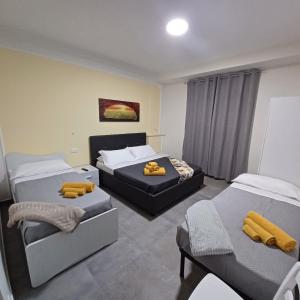 Postel nebo postele na pokoji v ubytování ACRONE GUEST HOUSE Centro Città (Locazione Turistica)