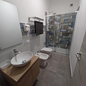 Koupelna v ubytování ACRONE GUEST HOUSE Centro Città (Locazione Turistica)