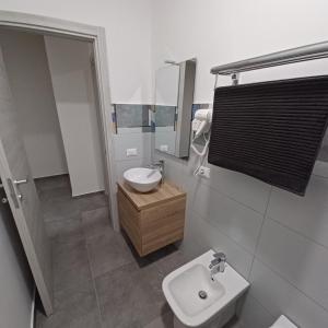 Koupelna v ubytování ACRONE GUEST HOUSE Centro Città (Locazione Turistica)