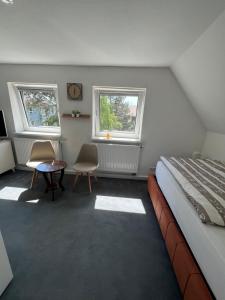 Postel nebo postele na pokoji v ubytování Ferienhaus Cassel