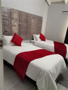 Cama ou camas em um quarto em Elihle Guest house