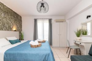 Posteľ alebo postele v izbe v ubytovaní Amarylis Beachfront Studios + 37 fotografií