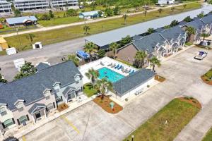 an overhead view of a house with a swimming pool at The Palms 2B by Pristine Property Vacation Rentals in Mexico Beach