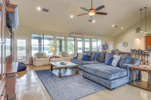 a living room with a couch and a table at Family-Friendly Alvarado Lake Home with Kayak, Canoe in Alvarado