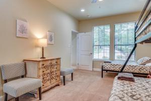 a bedroom with a bed and a dresser and a window at Family-Friendly Alvarado Lake Home with Kayak, Canoe in Alvarado