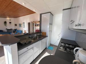 Kuchyňa alebo kuchynka v ubytovaní Casa Buckingham 27C