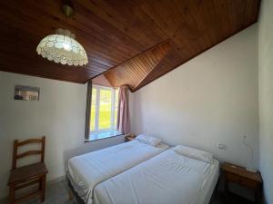 Posteľ alebo postele v izbe v ubytovaní Casa Buckingham 27C