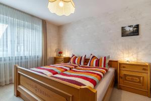 Postel nebo postele na pokoji v ubytování Ferienwohnung Berghansenhof