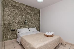 Posteľ alebo postele v izbe v ubytovaní Amarylis Beachfront Studios