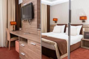 Кровать или кровати в номере Hotel Danubia Park