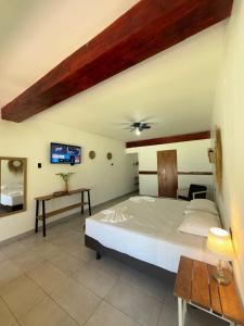 Cama o camas de una habitación en Costa Nueva