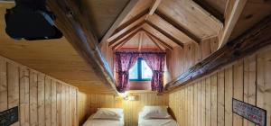 Postel nebo postele na pokoji v ubytování Hotel London