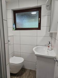 Koupelna v ubytování Cozy Reifnitz-mit Seezugang