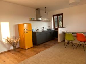 Kuchyň nebo kuchyňský kout v ubytování Villa Rosa Friuli + 26 fotografií