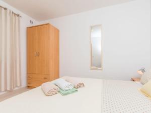 Postel nebo postele na pokoji v ubytování Apartment Fenix 2