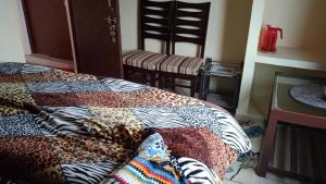 Cama o camas de una habitación en Chacha Sip ‘N’Dine Restaurant and Home Stay