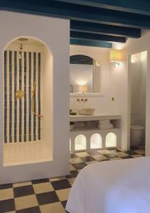 a bathroom with a shower and a sink at Canalejas 3 Vejer in Vejer de la Frontera +81 photos
