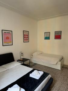 Un pat sau paturi într-o cameră la Giuliana Apartment