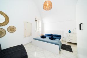 Postel nebo postele na pokoji v ubytování AcquaMarine by Vivimy