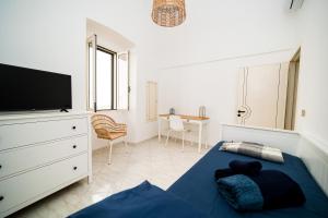 TV a/nebo společenská místnost v ubytování AcquaMarine by Vivimy