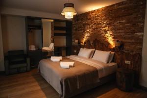 Letto o letti in una camera di Hotel Ushba in Mestia