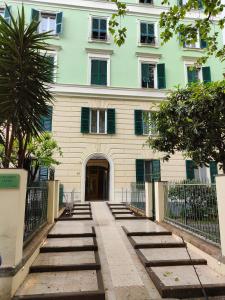 a building with a bunch of steps in front of it at Il Giardino di Elettra - FreeParking in Genoa