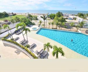 an overhead view of a swimming pool at a resort at Luxury Morros Seaway Cartagena in Cartagena de Indias