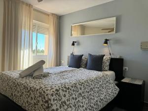 Säng eller sängar i ett rum på Penthouse Apartment, Riviera Del Sol