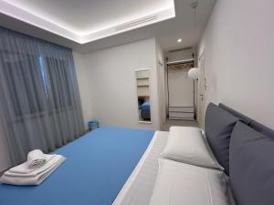 a hospital room with a bed and a chair at Elios Badino B&B in Terracina