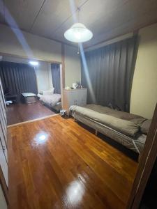 Φωτογραφία από το άλμπουμ του ゲストハウス なないろ σε Naze +5 φωτογραφίες