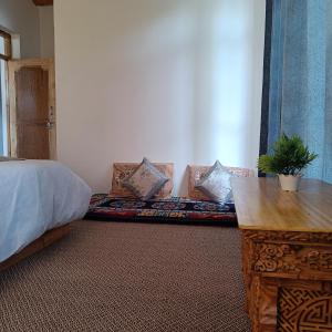 Posteľ alebo postele v izbe v ubytovaní TRAVELLER NEST