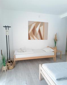 Postel nebo postele na pokoji v ubytování Sunčani apartman 2