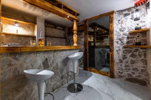 a bathroom with a sink and a mirror at Villa Old Town in Šibenik +37 photos