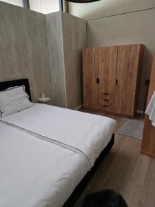 Posteľ alebo postele v izbe v ubytovaní Klein duimpje