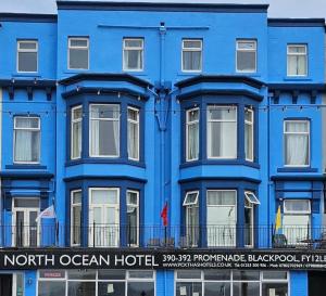 a blue building with a sign that reads north ocean hotel at North Ocean Hotel in Blackpool