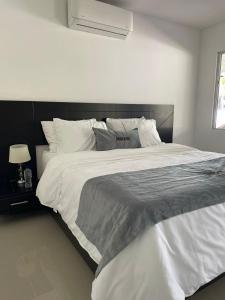 Voodi või voodid majutusasutuse Malokas Resort - Socorro - San Gil toas