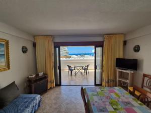 a bedroom with a bed and a view of the ocean at Parque Royale 1 apartment with an amazing ocean view in Adeje +26 photos